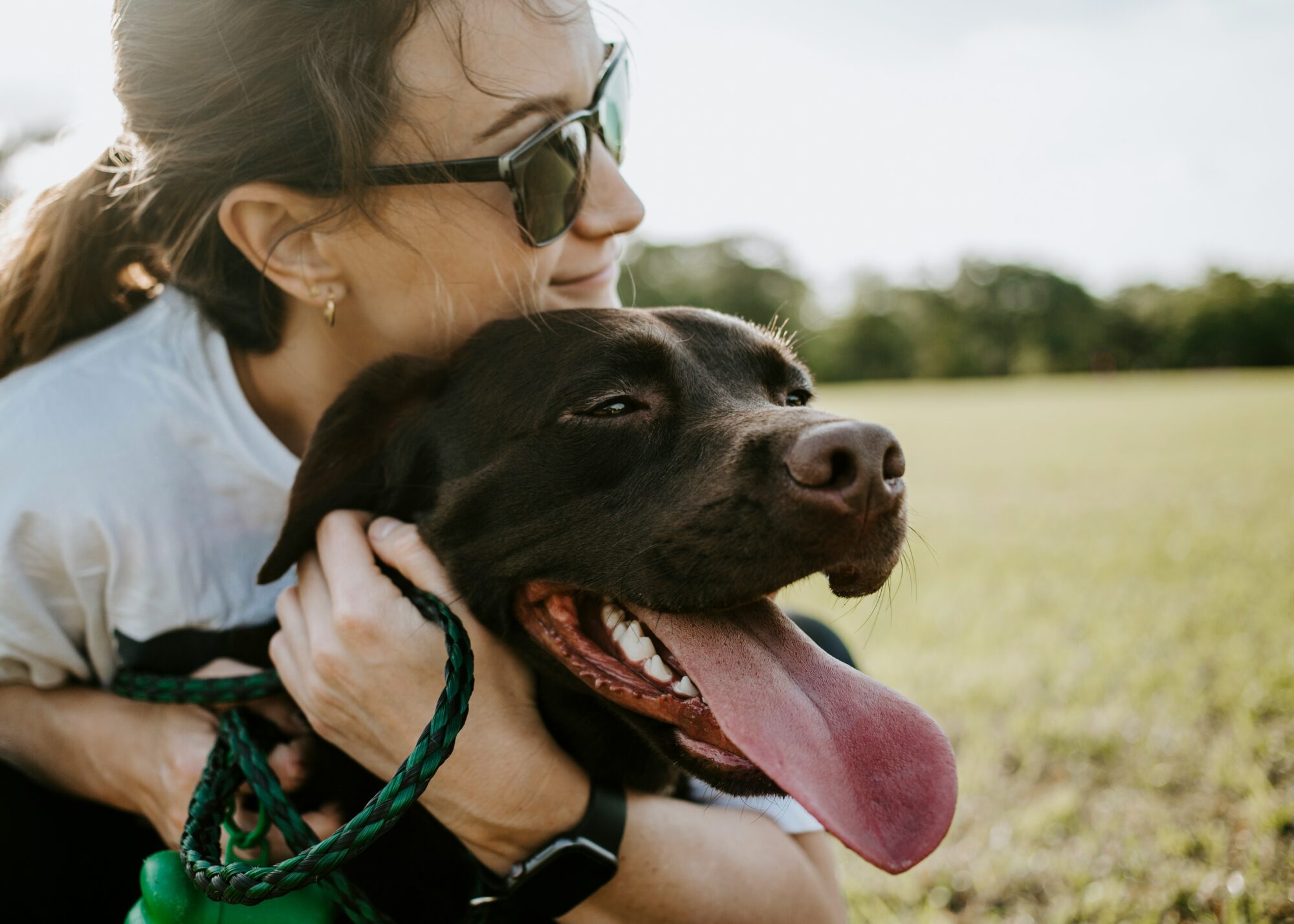 woman with brown dog